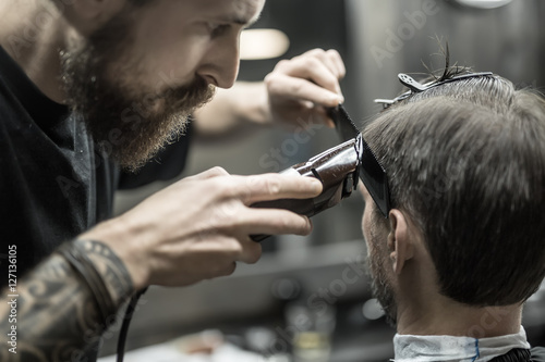 Cutting hair in barbershop