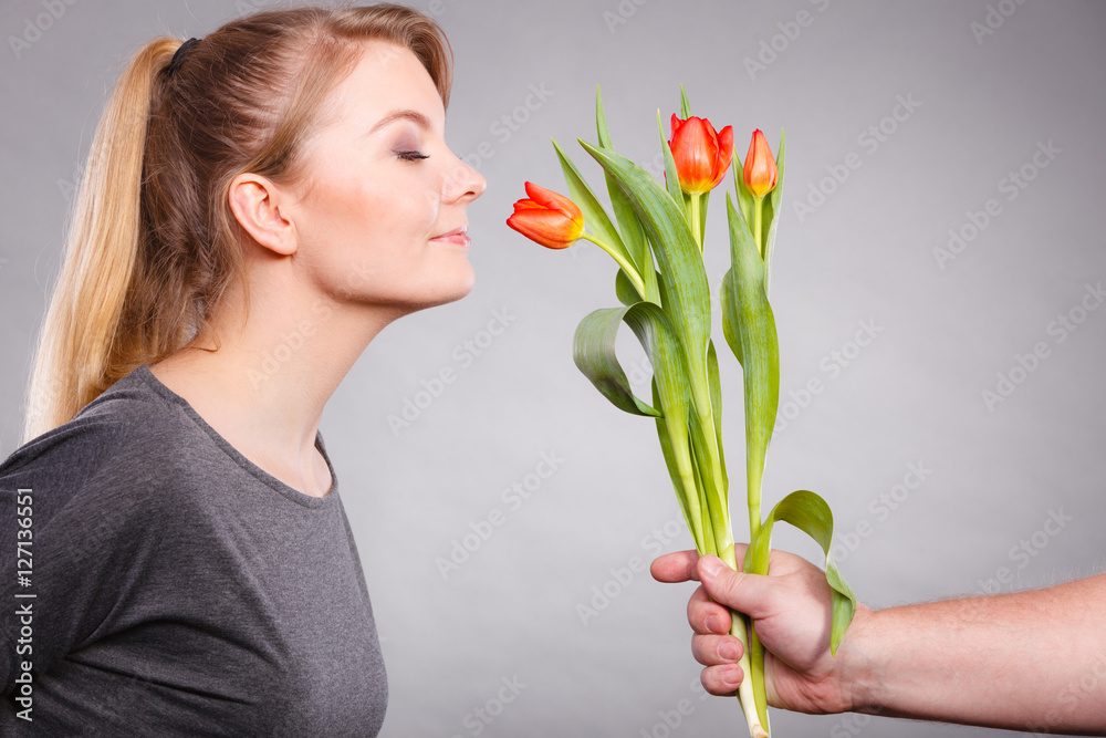 Charming woman smelling flower feel peace. Charming woman smelling flower feel peace.