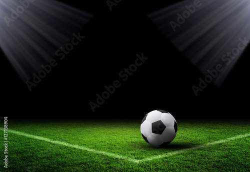 Soccer Ball and Grass on dark background 