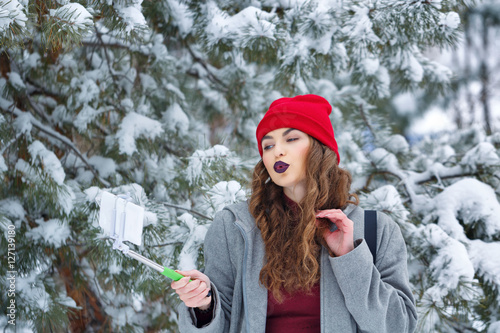 Hipster Girl makes selfie winter.