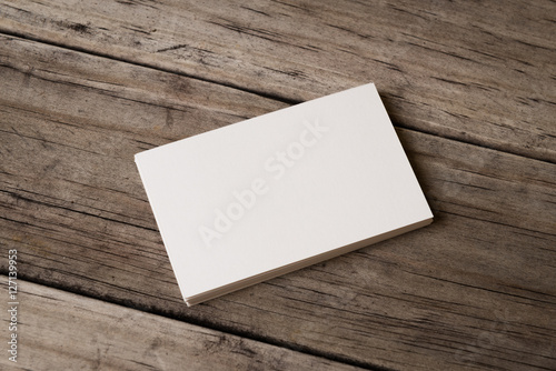 Business card blank on wood background