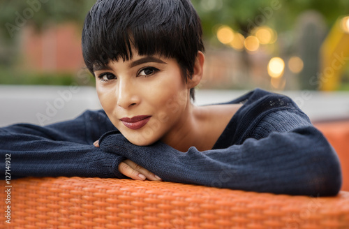Fotografie Attractive young woman with short stylish hair and friendly smile