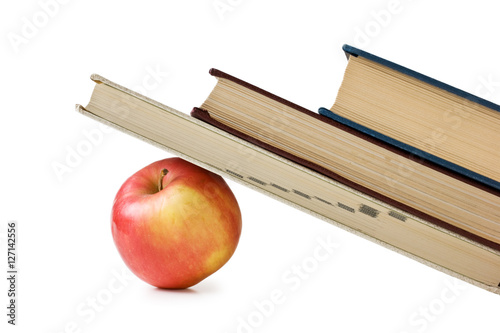 apple under a pile of books