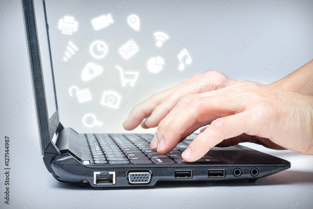 Multitasking on Laptop With Media Icons Multitasking on Laptop With Media Icons