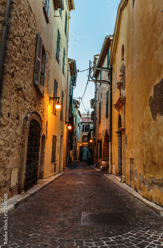 Narrow street in the old town Antibes in France. Night view © arbalest