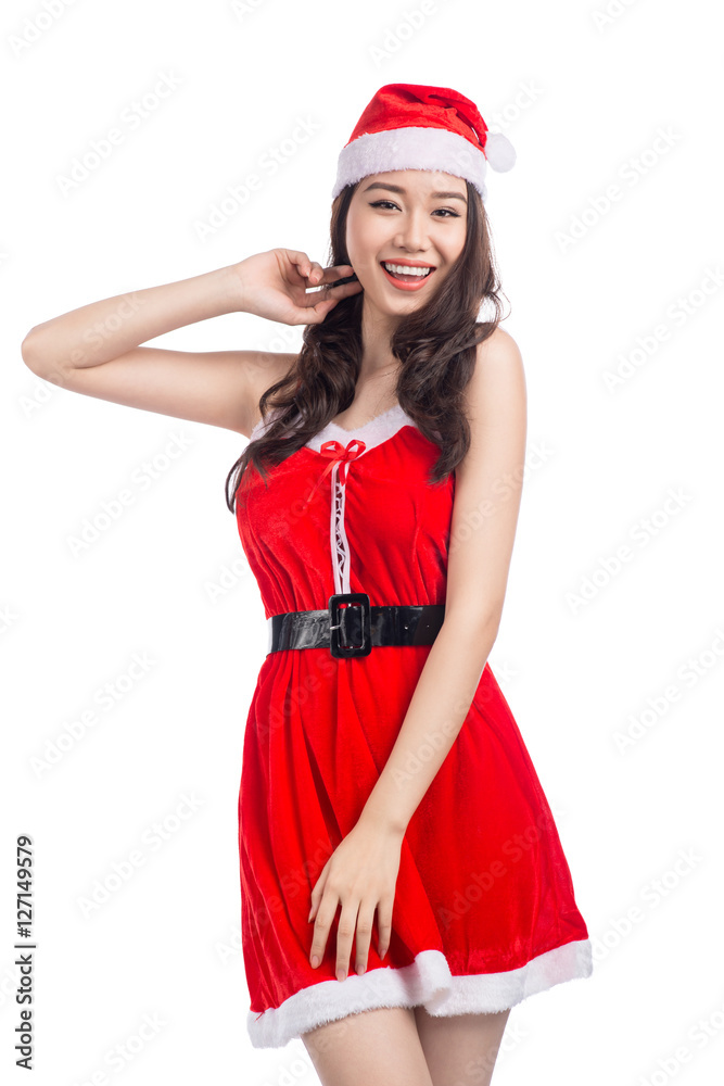 Christmas Woman. Beauty Asian Model Girl in Santa Costume isolat Christmas Woman. Beauty Asian Model Girl in Santa Costume isolat