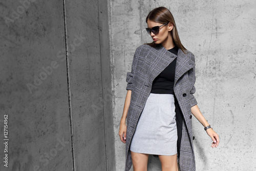 high fashion portrait of young elegant woman outdoor.