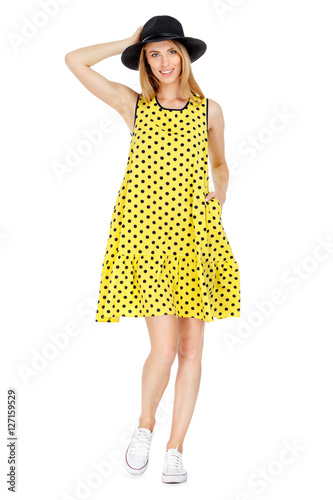 Fashion photo of young magnificent woman wearing fashionable summer clothes