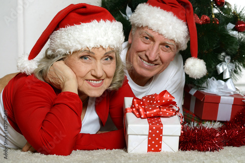 Senior couple celibrating Christmas  photo