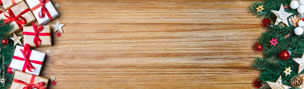 Fototapeta premium Christmas wooden background banner with tree, gift and decoratio