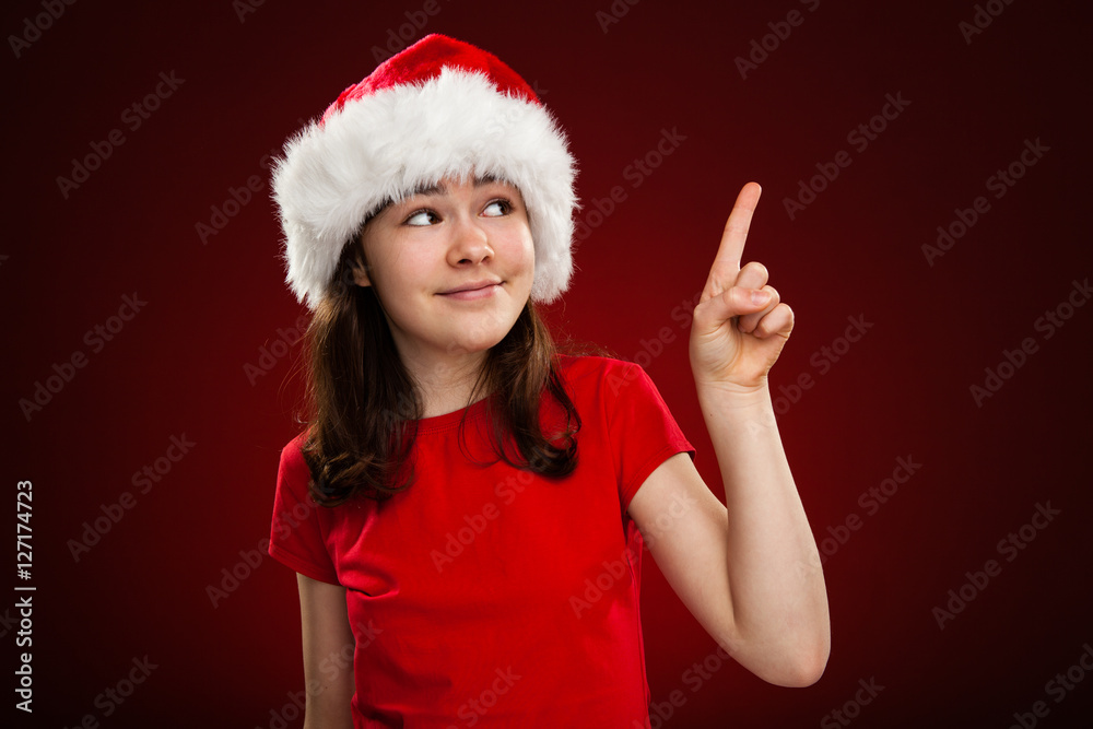 Christmas time - girl with Santa Claus Hat Christmas time - girl with Santa Claus Hat