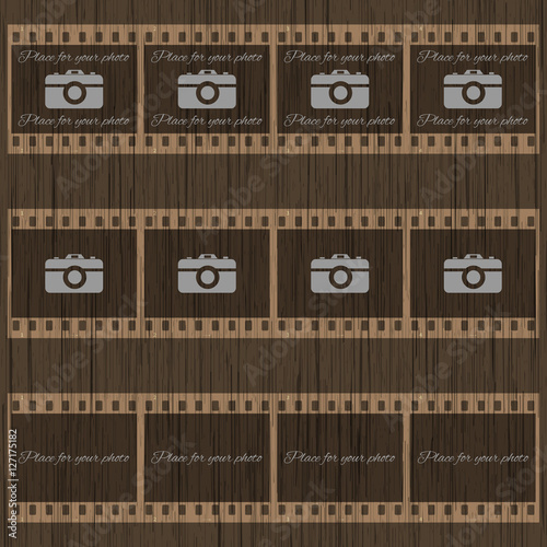 Filmstrip template with photo camera on wooden background