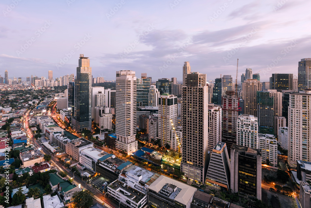 Fototapeta premium Makati Skyline at night, Philippines. Makati is a city in the Philippines` Metro Manila region and the country`s financial hub. 