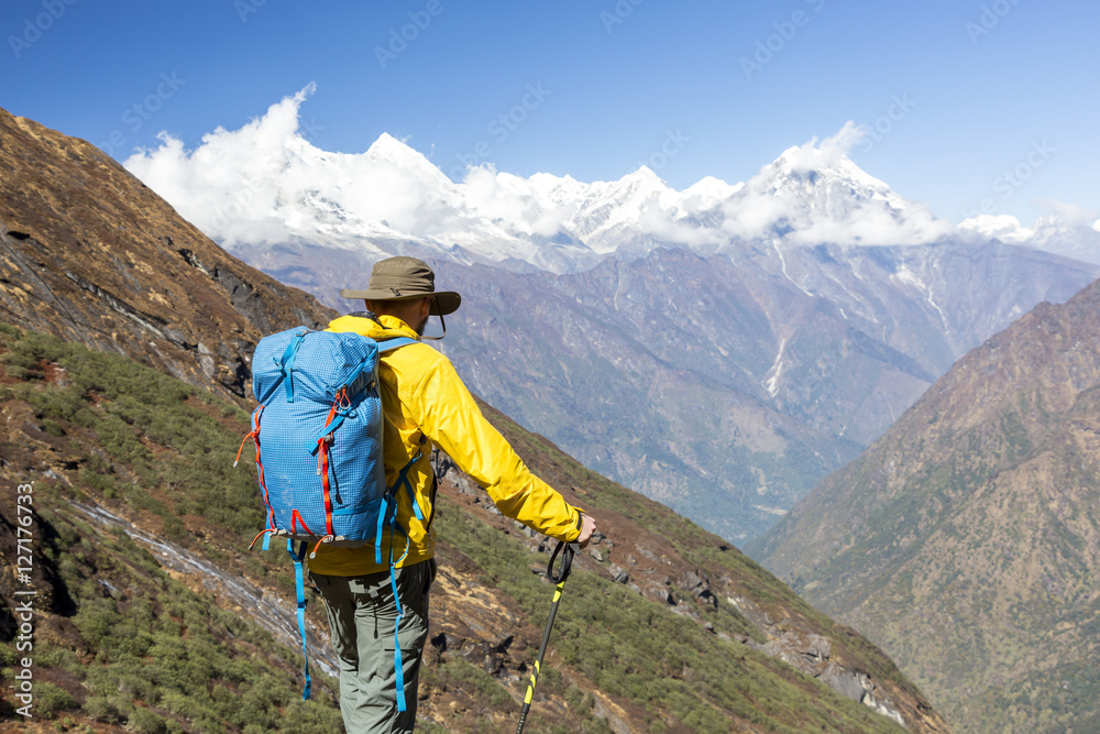 One male Hiker in Yellow Jacket enjoying Mountain View