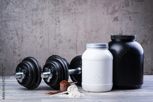 Classic black dumbbells with protein jars