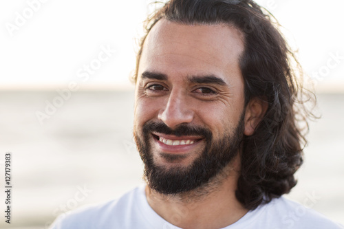 happy smiling man with beard outdoors