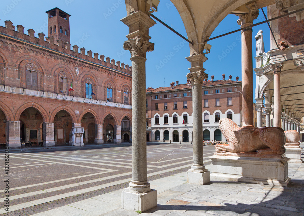 CREMONA, ITALY - MAY 24, 2016: The lions in front of The Cathedral Assumption of the Blessed Virgin Mary and Palazzo Coumnale.