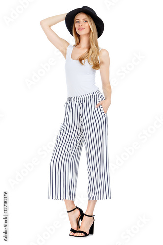 Tableau sur toile Fashion photo of young magnificent woman wearing fashionable summer clothes