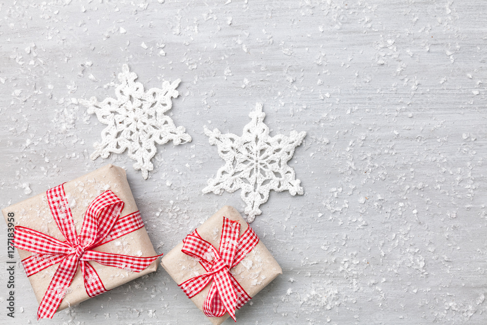 Christmas decoration and snow on grey background with copy space