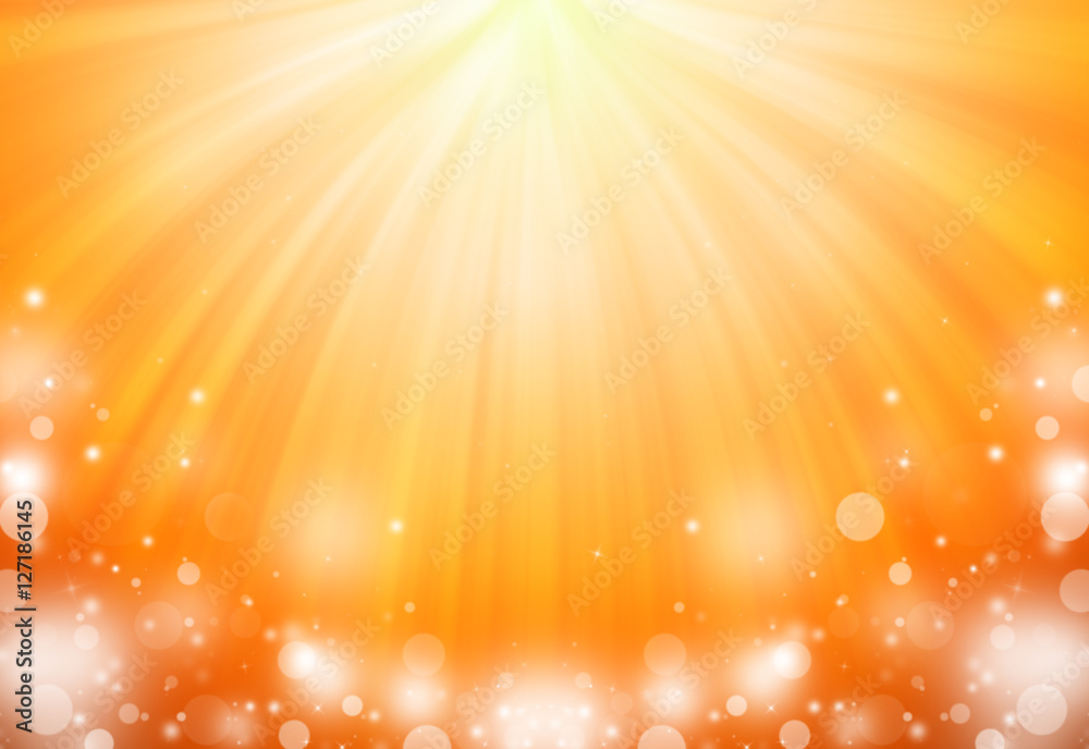 Naklejka premium Gold and Orange glitter sparkles defocused rays lights bokeh abstract background/texture.