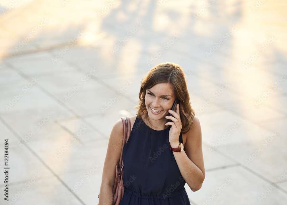Germany, Hamburg, Young businesswoman talking on the phone Germany, Hamburg, Young businesswoman talking on the phone