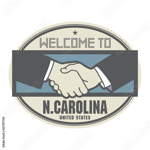 Business concept with handshake and text Welcome to North Carolina