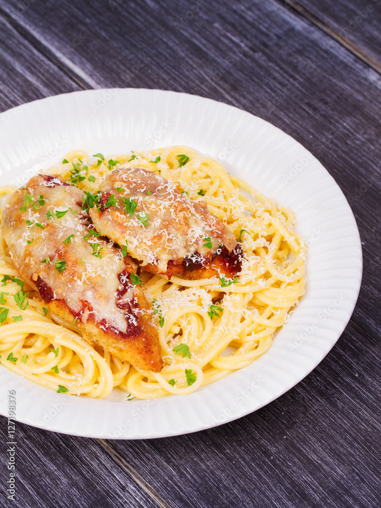 Chicken parmesan and pasta. Chicken breasts and spaghetti Chicken parmesan and pasta. Chicken breasts and spaghetti