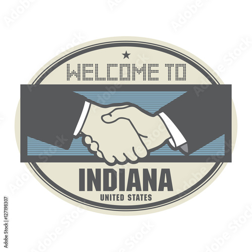 Business concept with handshake and the text Welcome to Indiana,