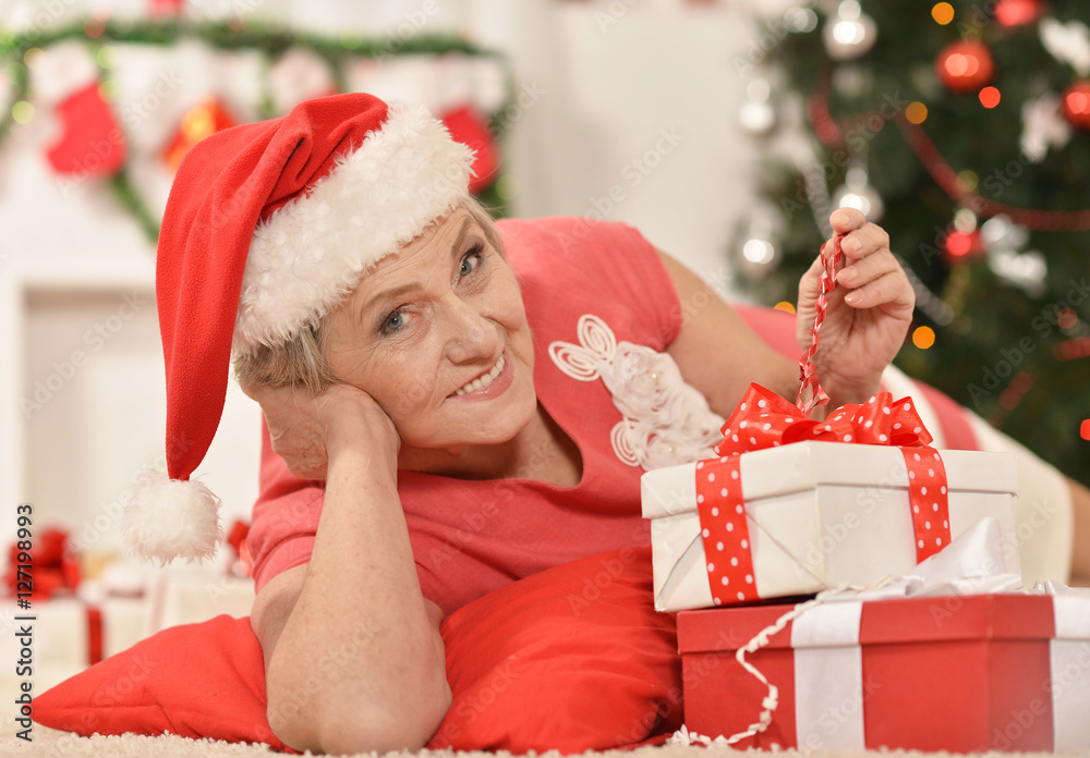 Senior woman with gifts Senior woman with gifts