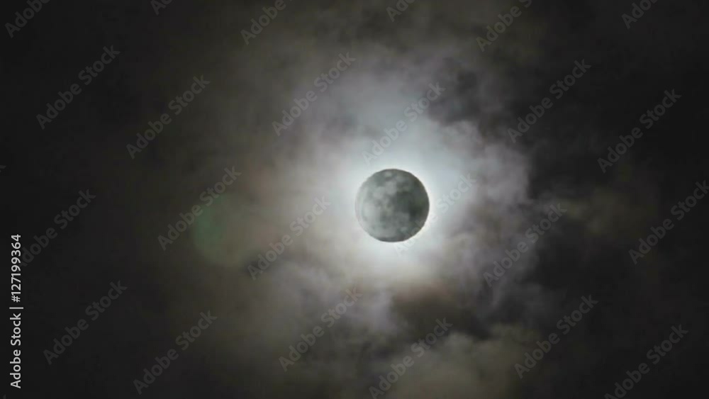 The full moon lay hidden behind the clouds in the middle of the lunar month (or Loi krathong day of Thailand). (HD footage no sound) The full moon lay hidden behind the clouds in the middle of the lunar month (or Loi krathong day of Thailand). (HD footage no sound)