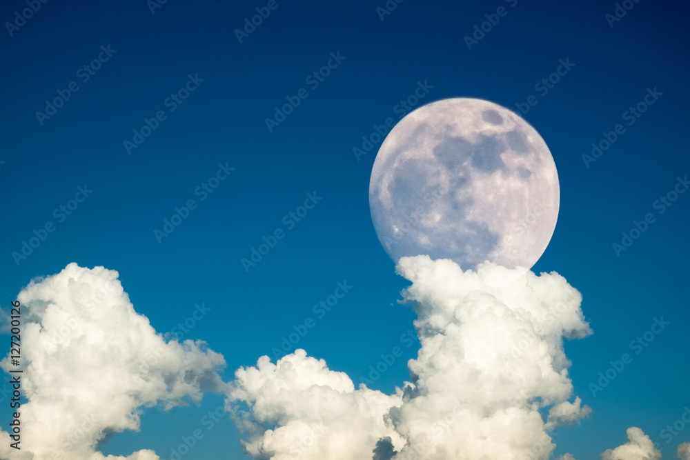 super full moon in 68 years with clear blue sky cloud daytime for background backdrop use super full moon in 68 years with clear blue sky cloud daytime for background backdrop use