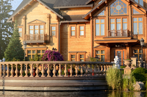 NOVI PETRIVTSI, KYIV, UKRAINE - July 24, 2016: Mezhyhirya - former private residence of ex-president Victor Yanukovich. Big wooden club house.