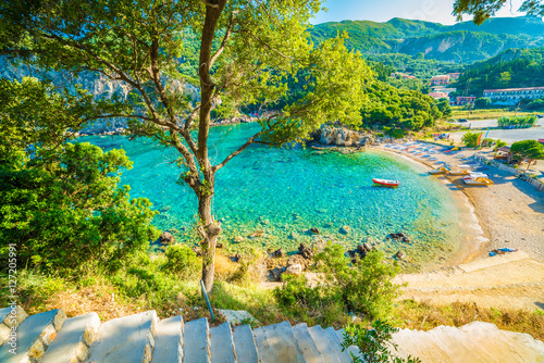 Fototapeta Naklejka Na Ścianę i Meble -  Amazing beach and boat in Paleokastritsa, Corfu island, Greece