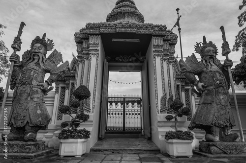 Stone Thai-Chinese style sculpture and thai art architecture in Wat Phra Chetupon Vimolmangklararm (Wat Pho) temple, Thailand. Photo taken on: 2 November , 2016 photo