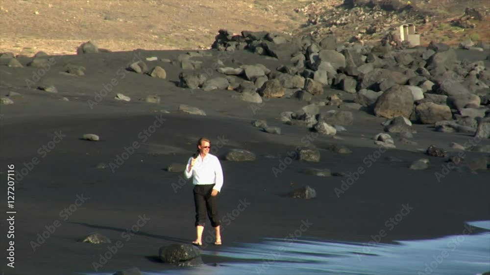 10539 business man happy jump rock black beach
10539 business man happy jump rock black beach