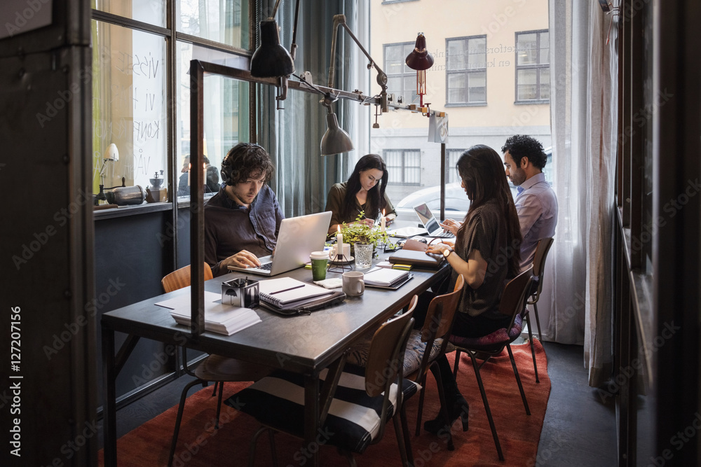 Business people working in modern office Business people working in modern office