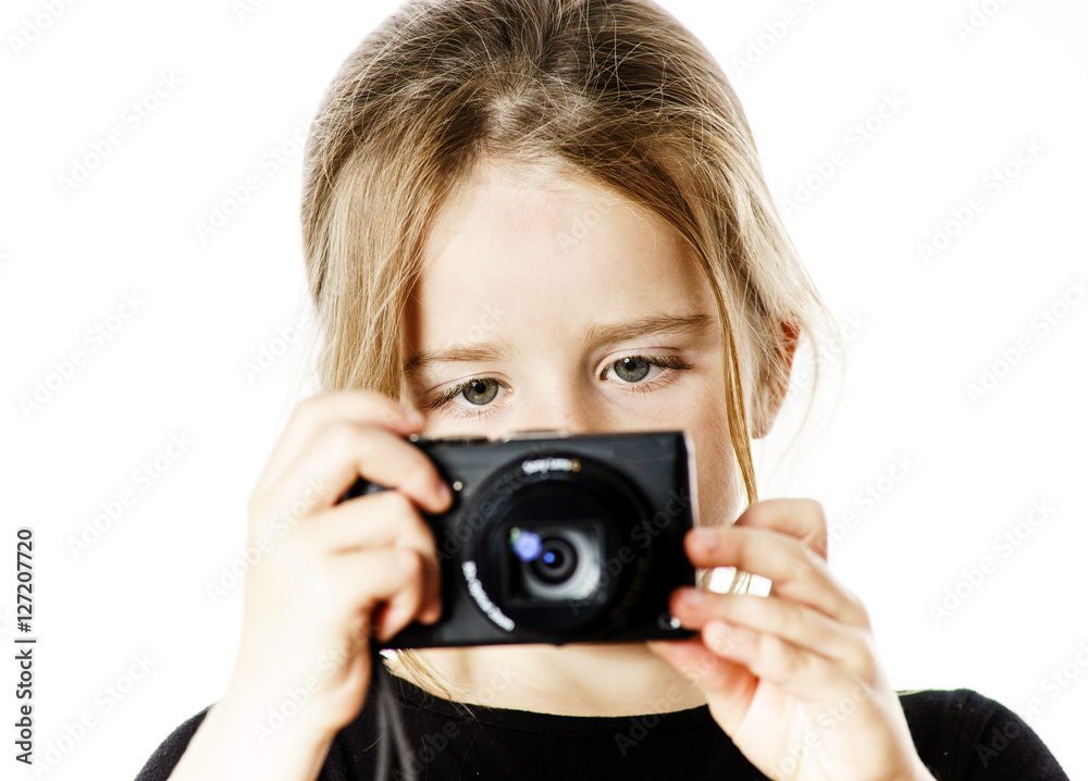 Cute little girl with compact digital camera Cute little girl with compact digital camera