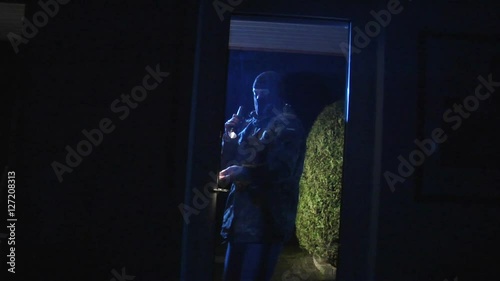 10843 burglar comes in watch around with torch
