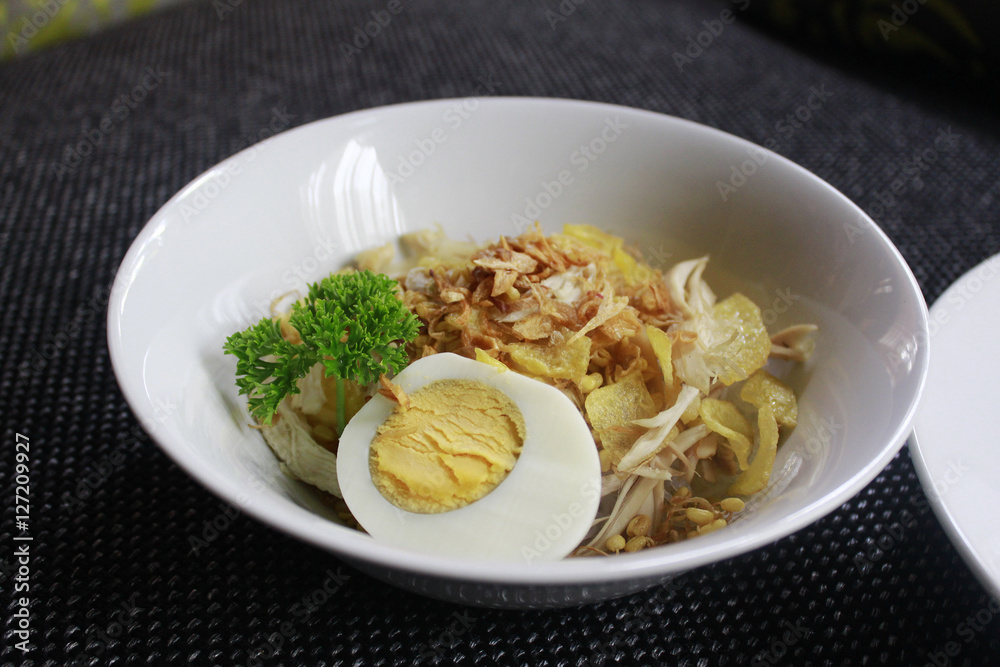 Soto Ayam or Chicken Soto.. One most popular food in Indonesia.. Many province have this Soto Ayam.. And this one is from Madura - East Java.. Taken alone, not with sambel (chili). Soto Ayam or Chicken Soto.. One most popular food in Indonesia.. Many province have this Soto Ayam.. And this one is from Madura - East Java.. Taken alone, not with sambel (chili).