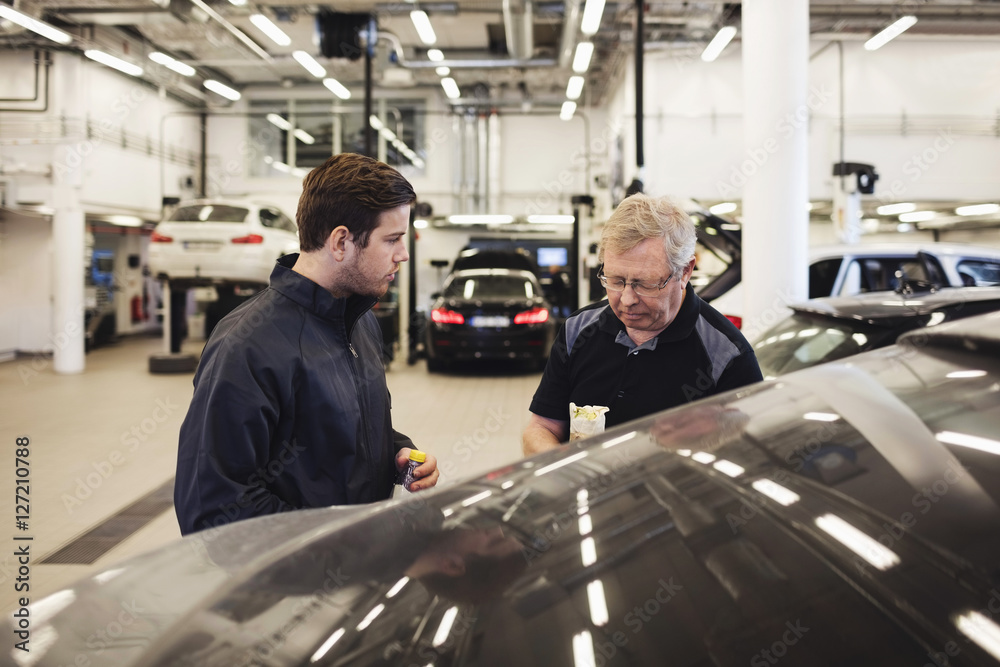custom made wallpaper toronto digitalMechanics talking while standing in auto repair shop