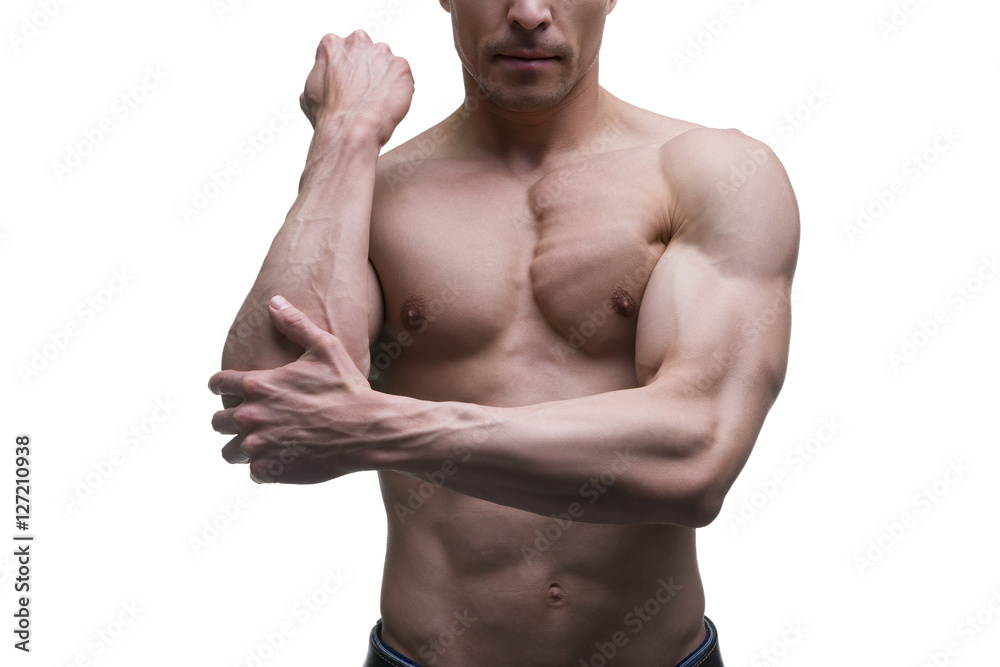 Muscular middle-aged man posing on white background, isolated studio shot