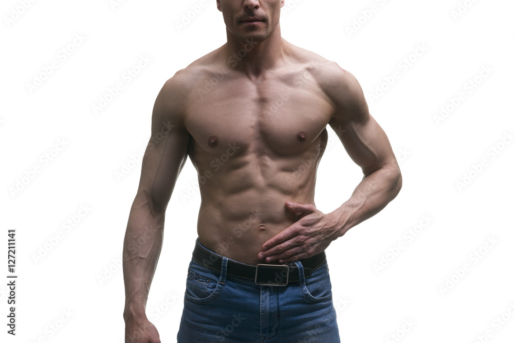 Muscular middle-aged man posing on white background, isolated studio shot Muscular middle-aged man posing on white background, isolated studio shot