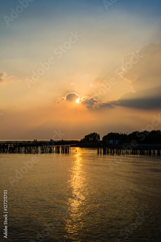 Silhouettes Sunset by the sea coastal Bangkok, Thailand