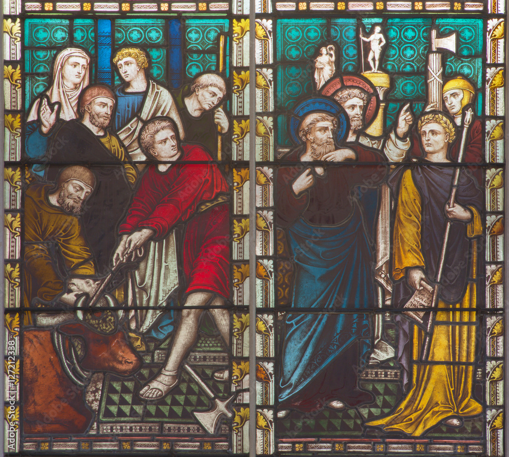 ROME, ITALY - MARCH 9. 2016: The scene St. Paul against the pagan offertory of animals on the stained glass of All Saints' Anglican Church by workroom Clayton and Hall (19. cent.).