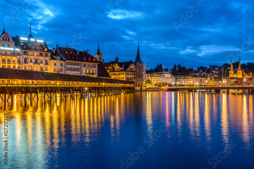 Night view towards Chapel Bridge  Kapellbruecke  together with the octagonal tall tower  Wasserturm  it is one of the Lucerne s most famous tourists attraction