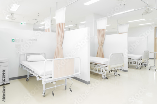 Hospital room with medical bed photo
