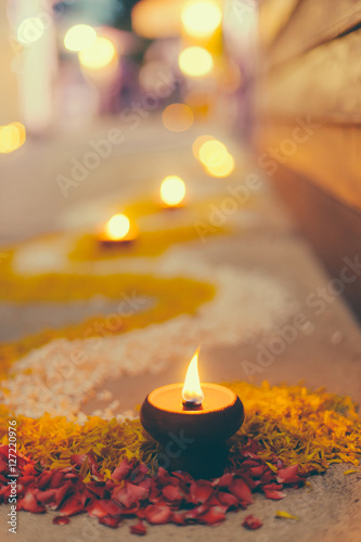 Asian Thai style traditional culture oil fire candle lantern with blur bokeh background for art design postcard brochure.