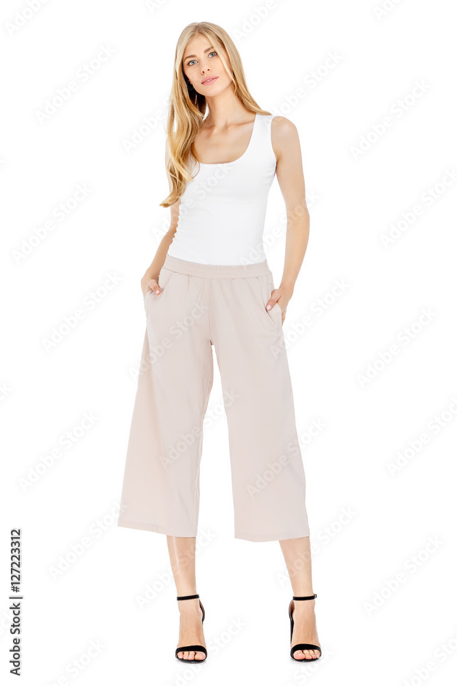 Fashion photo of young magnificent woman wearing fashionable summer clothes Fashion photo of young magnificent woman wearing fashionable summer clothes