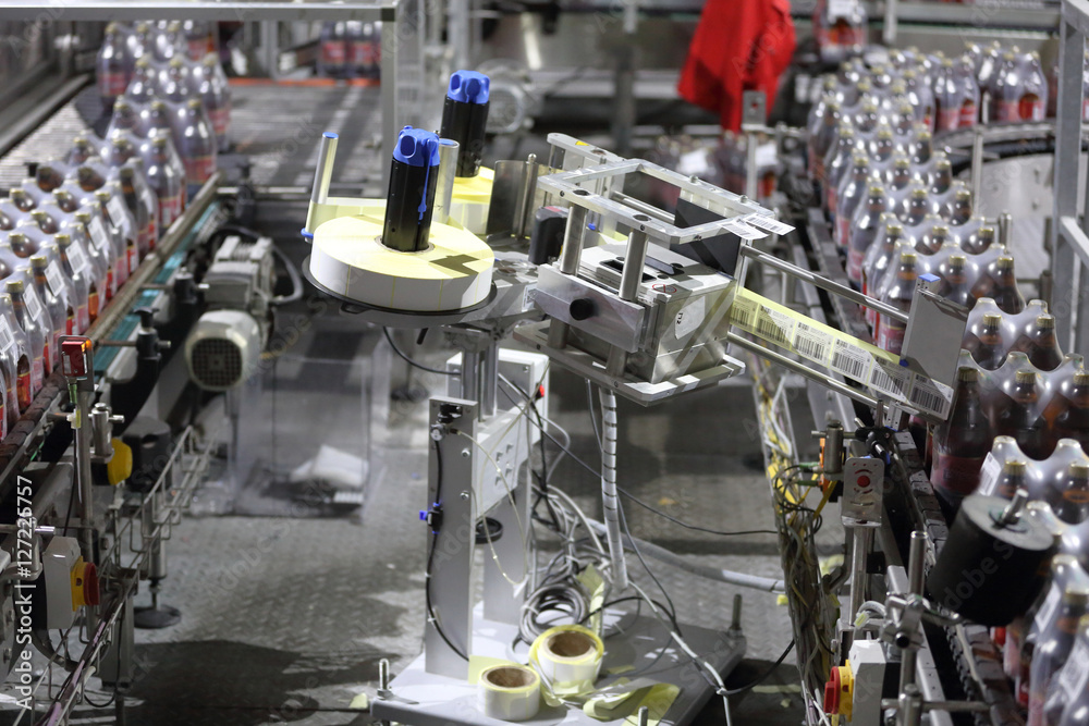 Fototapeta premium Equipment, industrial tools and machinery for the production of beer in factory shops