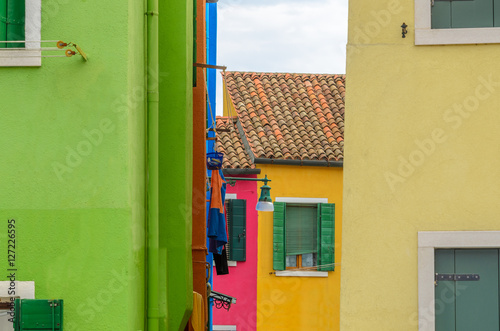 Beautiful window decorated with flowers in Italy